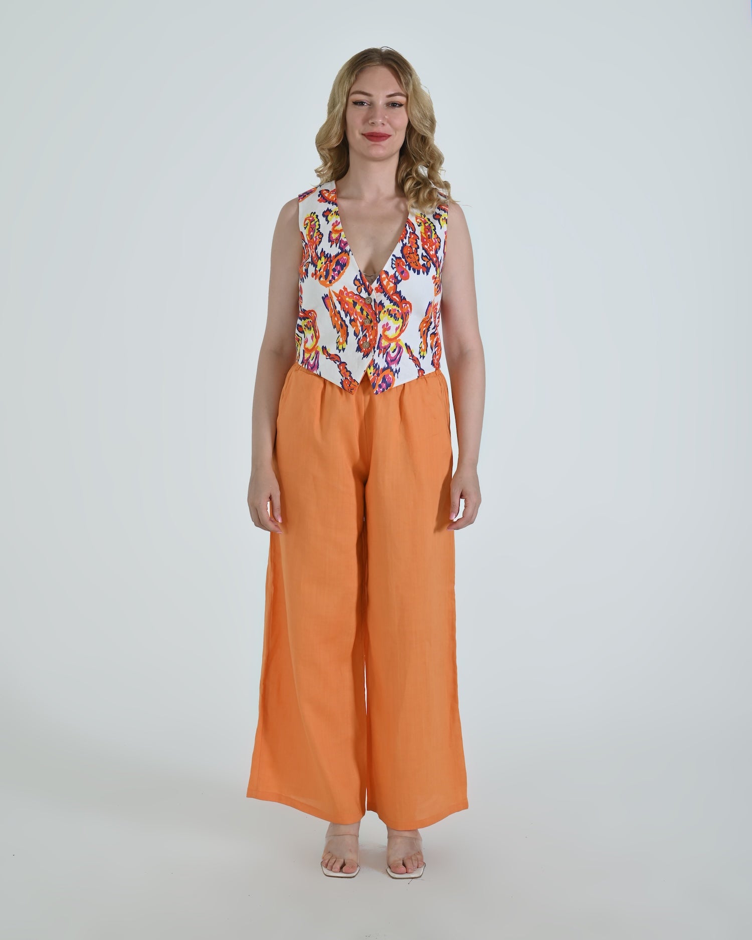 The Vento Reversible Vest & Pants Set - Orange Paisley