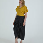 High-waisted sculptural skirt in structured wool blend by Lumina Eligma
Architectural wool-blend skirt with pinstripes – Lumina Eligma
Luxury designer skirt with asymmetrical draping
Modern tailored skirt for women – Lumina Eligma
