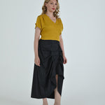 High-waisted sculptural skirt in structured wool blend by Lumina Eligma
Architectural wool-blend skirt with pinstripes – Lumina Eligma
Luxury designer skirt with asymmetrical draping
Modern tailored skirt for women – Lumina Eligma
