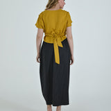 High-waisted sculptural skirt in structured wool blend by Lumina Eligma
Architectural wool-blend skirt with pinstripes – Lumina Eligma
Luxury designer skirt with asymmetrical draping
Modern tailored skirt for women – Lumina Eligma
